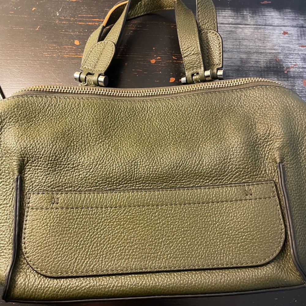 Green leather tote. Some wear on handles see pics.